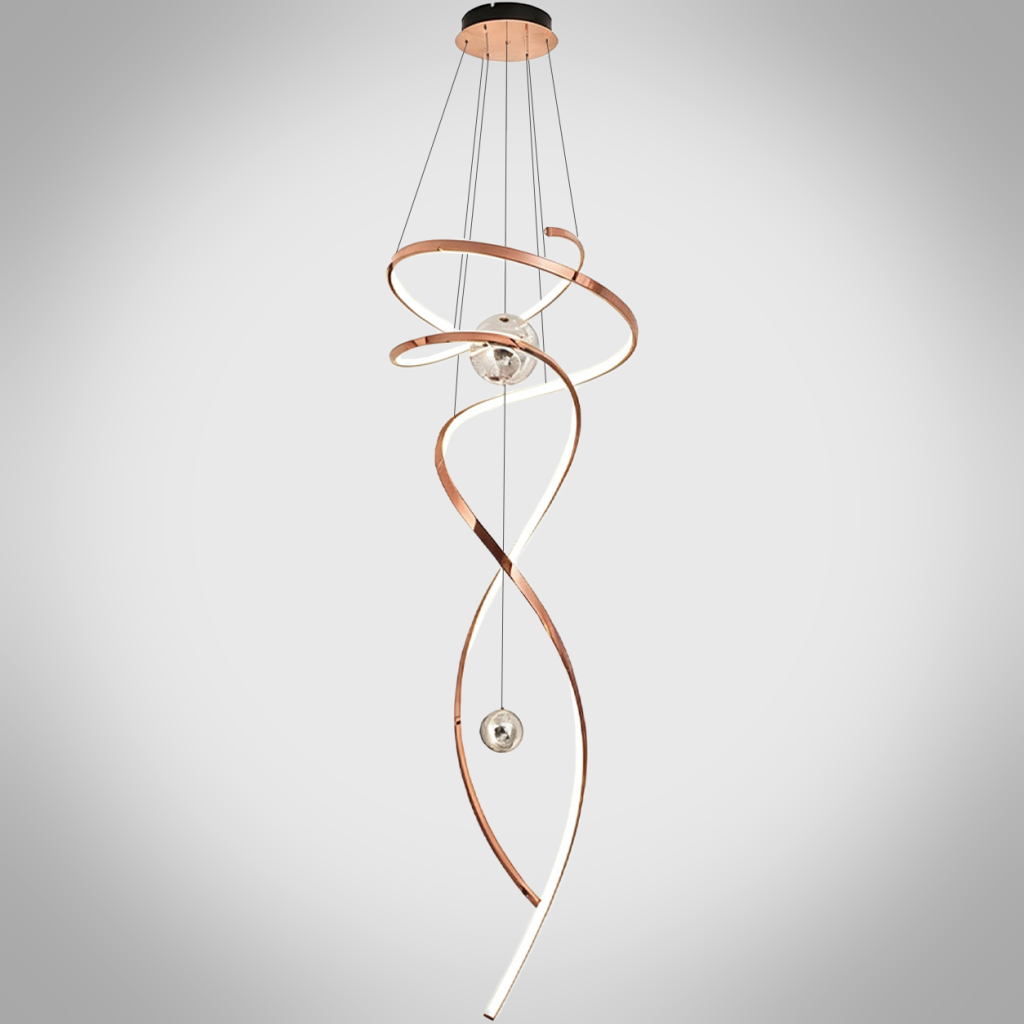 Modern rose gold stainless steel helical helix LED wave pendant light with floating orb spheres suspended in a high ceiling foyer