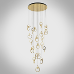 Modern gold stainless steel interlocking ring cascade chandelier suspended in a high ceiling villa foyer