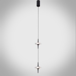 Two staggered black aluminum ufo crystal pendant lights hanging gracefully over a modern wooden dining table