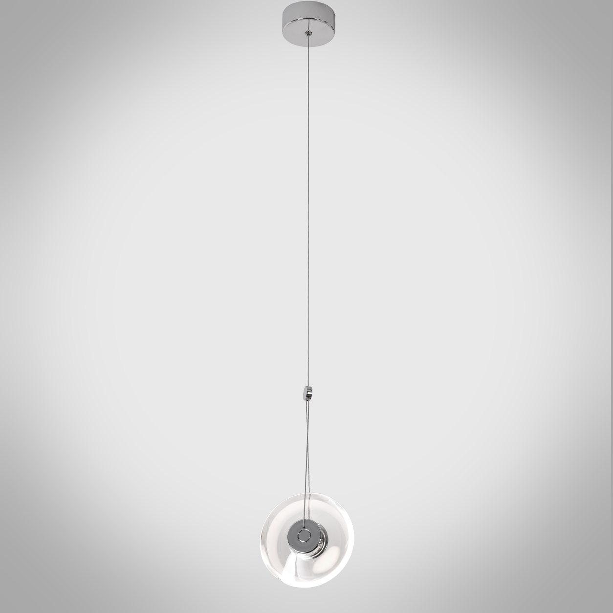 Modern minimalist pendant light featuring a clear crystal disc and polished chrome aluminum core, suspended against a clean white background.