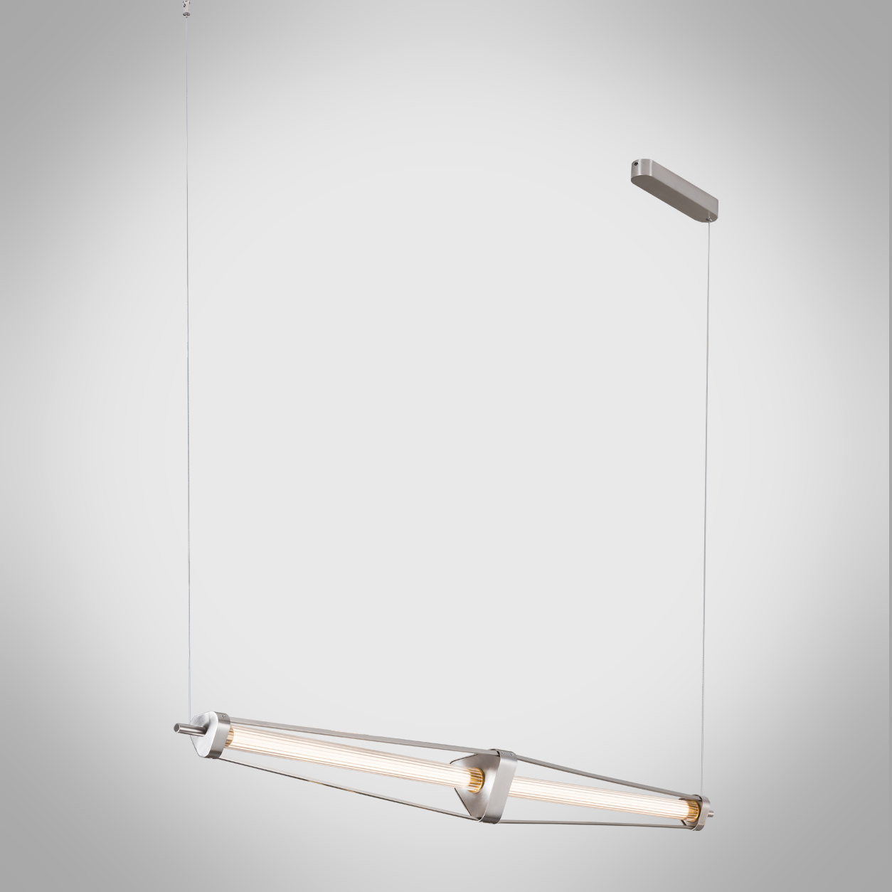 Architectural linear chandelier featuring brushed stainless steel frame, aluminum core, and fluted crystal tube hanging on stainless steel cables