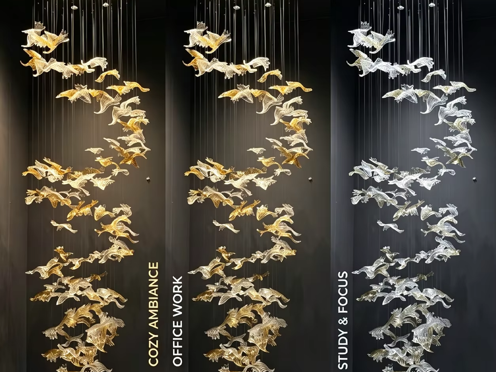 Close-up of wave-textured clear and gold foil crystal bird blades on a luxury pendant chandelier