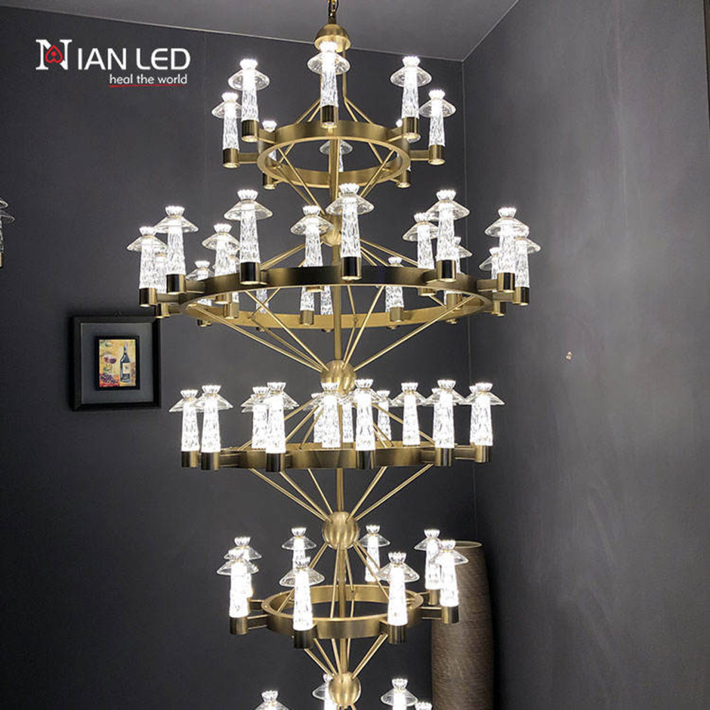 Grand multi-tiered stainless steel and crystal ring chandelier for high ceiling hotel lobby and villa staircase foyer