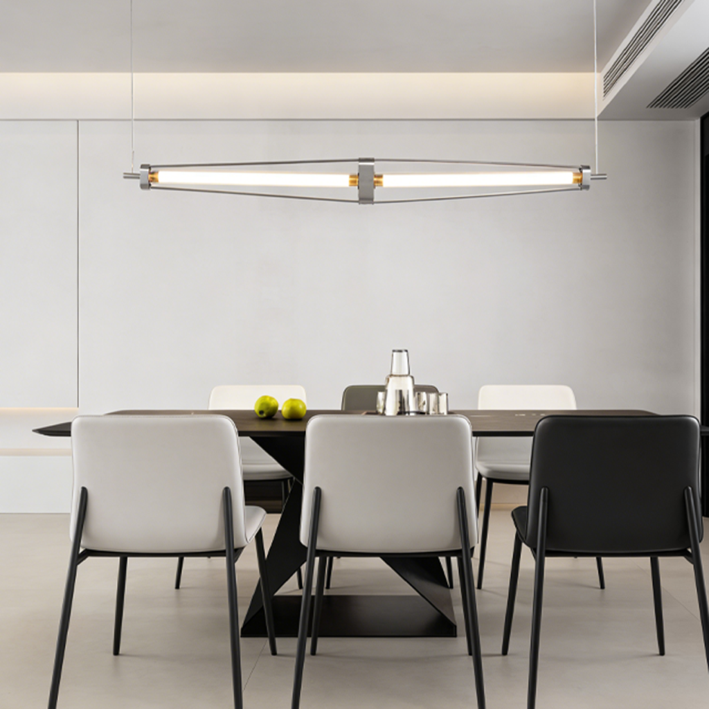 Architectural linear chandelier featuring brushed stainless steel frame, aluminum core, and fluted crystal tube hanging on stainless steel cables