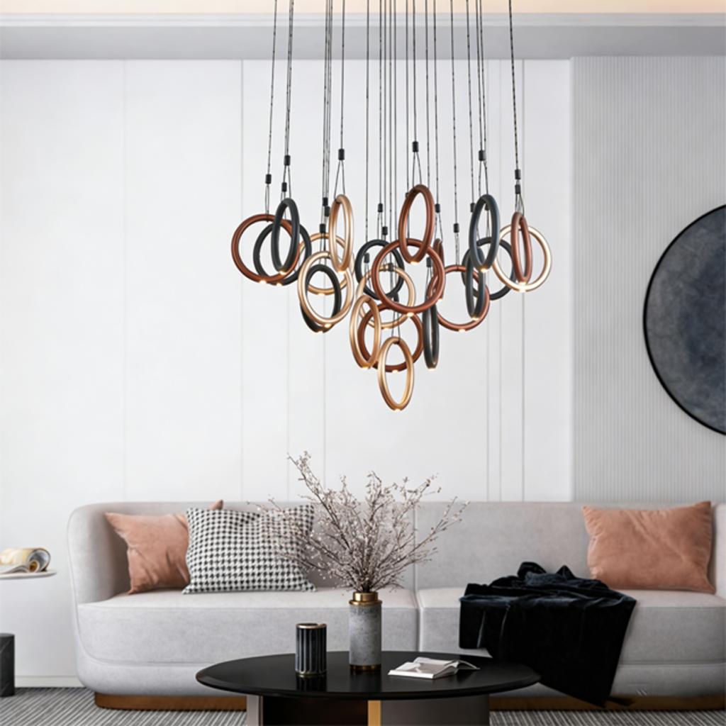 Modern multi-tone ring cascade chandelier with gold, bronze, and black hoops for high ceiling staircase and foyer