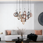 Modern multi-tone ring cascade chandelier with gold, bronze, and black hoops for high ceiling staircase and foyer