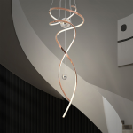 Modern rose gold stainless steel helical helix LED wave pendant light with floating orb spheres suspended in a high ceiling foyer