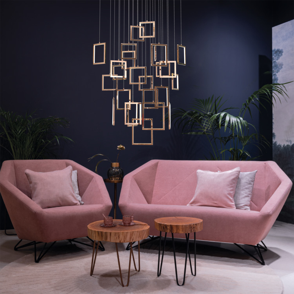 Modern rose gold stainless steel square frame cascade chandelier with mirror canopy suspended in a high ceiling foyer