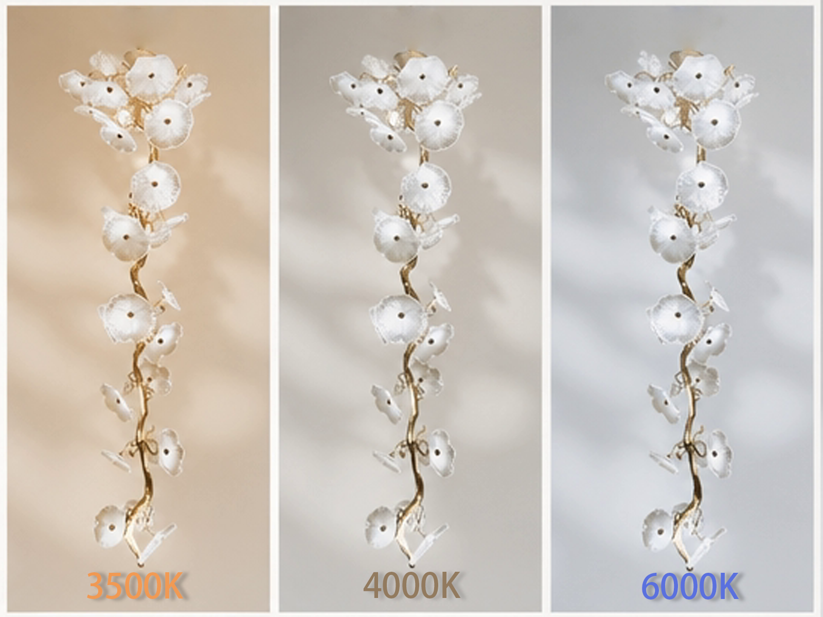 Handcrafted organic glass leaf tree branch vertical chandelier hanging in a luxury high-ceiling staircase foyer