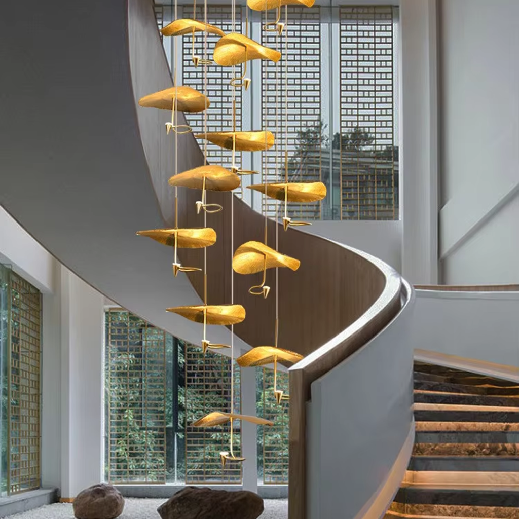 Modern luxury hand-hammered gold ginkgo leaf multi-light cascading chandelier for high ceiling staircase and duplex foyer