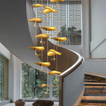 Modern luxury hand-hammered gold ginkgo leaf multi-light cascading chandelier for high ceiling staircase and duplex foyer