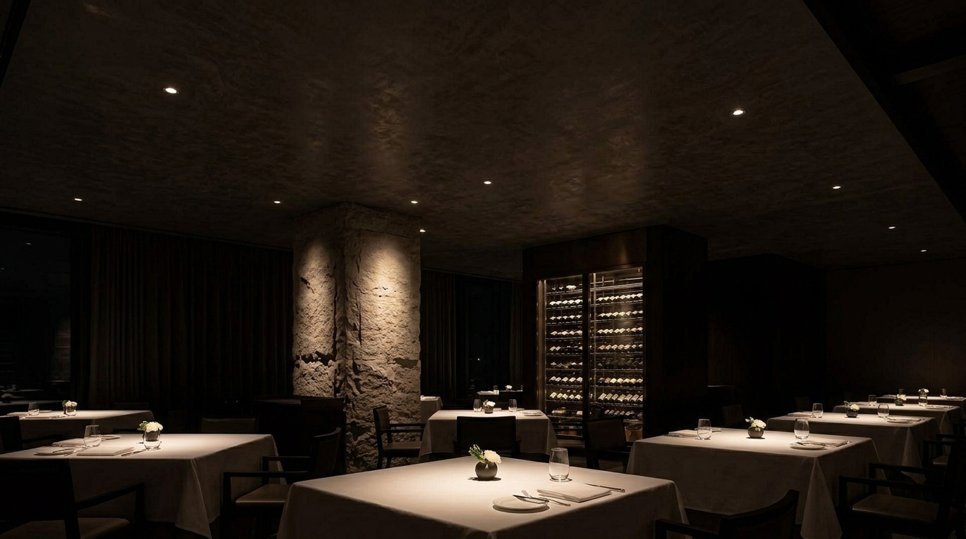 Restaurant illuminated by modern black deep-recessed LED downlight, architectural anti-glare lighting design