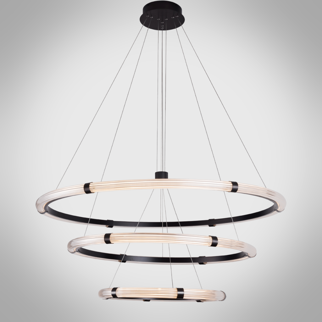The Aura 3 tier fluted acrylic LED ring chandelier hanging in a modern double height ceiling living room