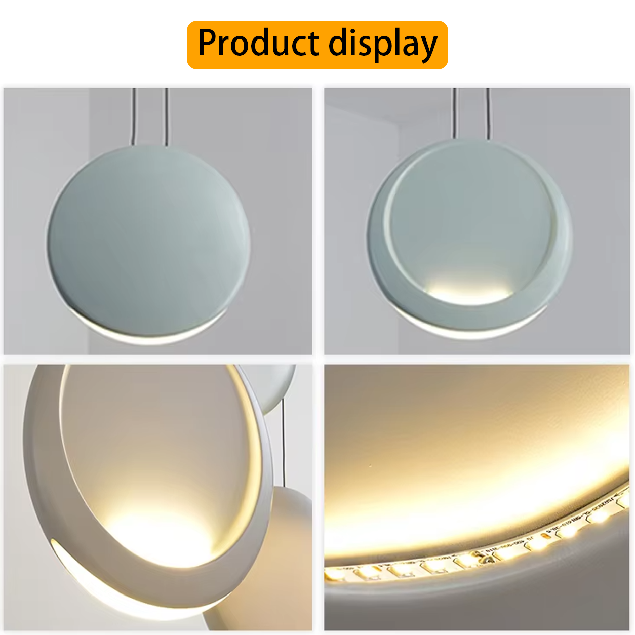 Close-up of matte grey, black, and white polyresin disc light shades showing crescent LED illumination and metal suspension cords