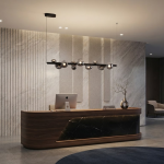 The Constellation smoky glass sphere linear chandelier hanging over a modern marble reception desk