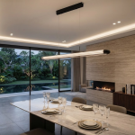 The Ray fluted acrylic linear LED pendant light suspended over a large marble dining table in a luxury home