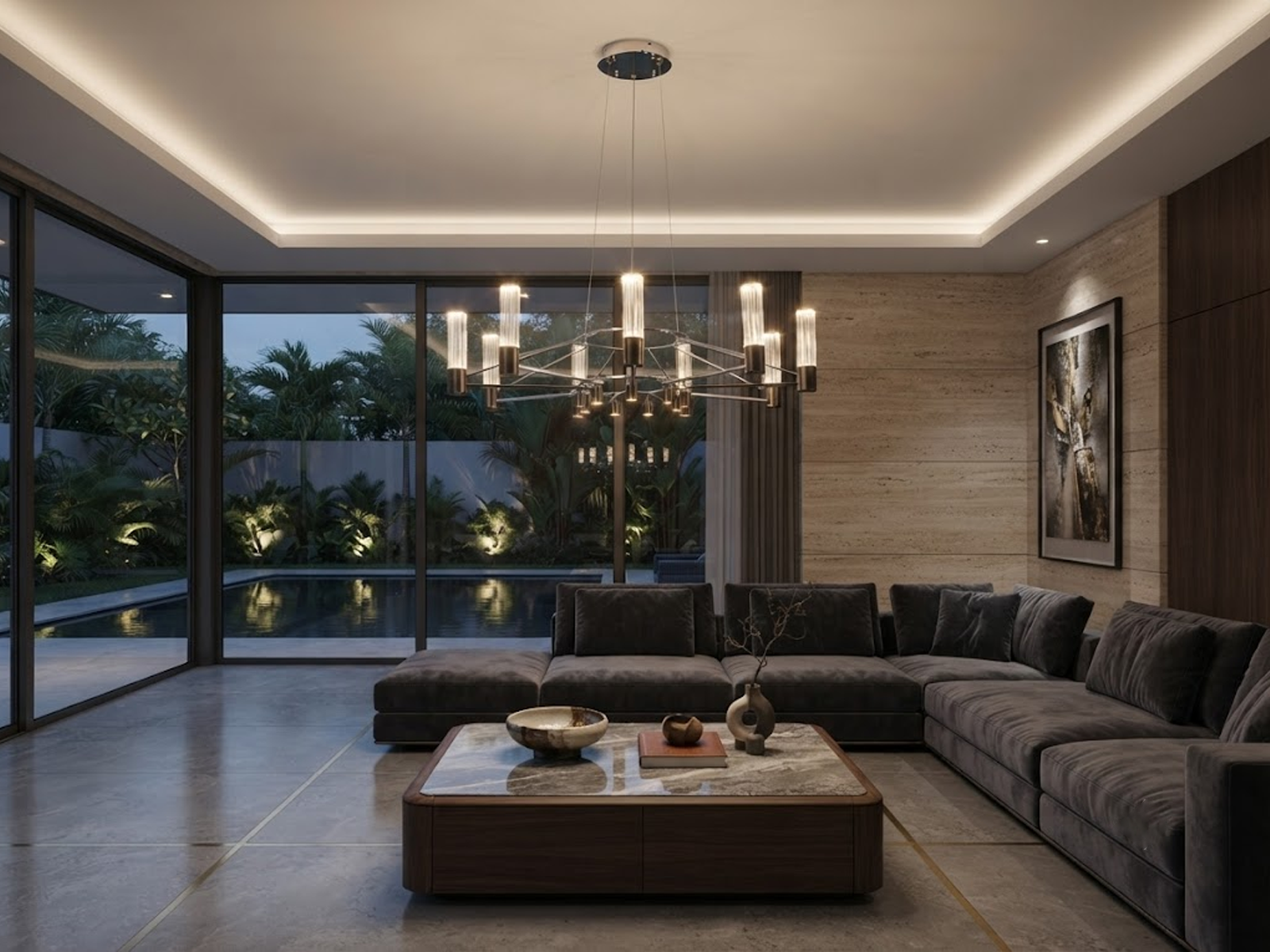 The Crown multi light fluted glass ring chandelier suspended over a modern sectional sofa in a high ceiling living room