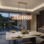 The Cell linear glass globe bubble chandelier with champagne gold textured core and pink accent globes
