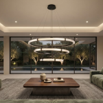 The Aura 3 tier fluted acrylic LED ring chandelier hanging in a modern double height ceiling living room