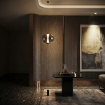 The Solstice modern glass globe pendant light suspended with bottom counterweight cylinder
