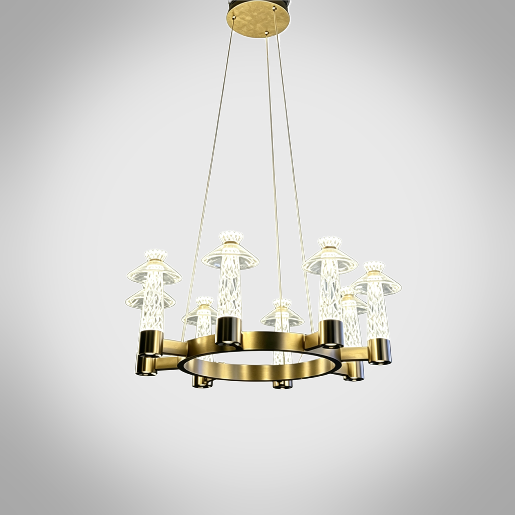 Carved crystal ring chandelier with brushed brass stainless steel frame suspended over a marble dining table in a luxury dining room
