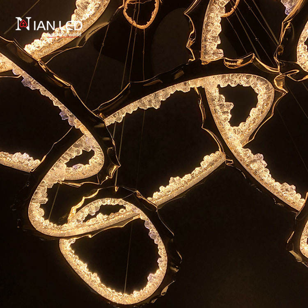 ianled luxury gold organic wave LED chandelier close-up with frosted optical acrylic diffuser and electroplated zinc alloy body