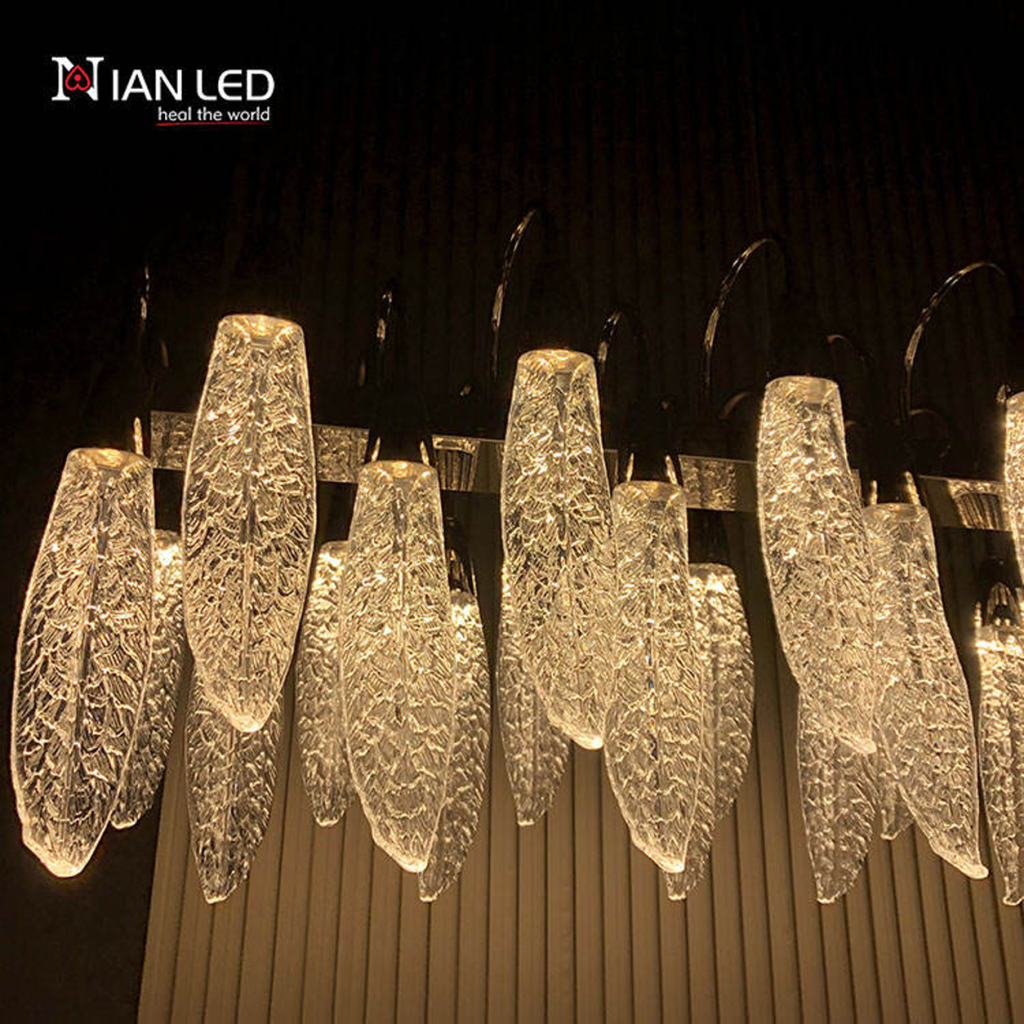 Side angle view of linear steel chandelier frame showing zinc alloy curved suspension hooks and frosted acrylic feather diffusers