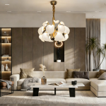 Modern blooming petal LED chandelier suspended in a contemporary luxury living room with beige sofas and wooden paneling