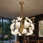 Spherical blooming petal LED chandelier hanging over a marble dining table in a contemporary luxury apartment