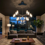 Modern tiered molecular branch LED chandelier with polished chrome finish suspended over a luxury dark dining table with velvet chairs
