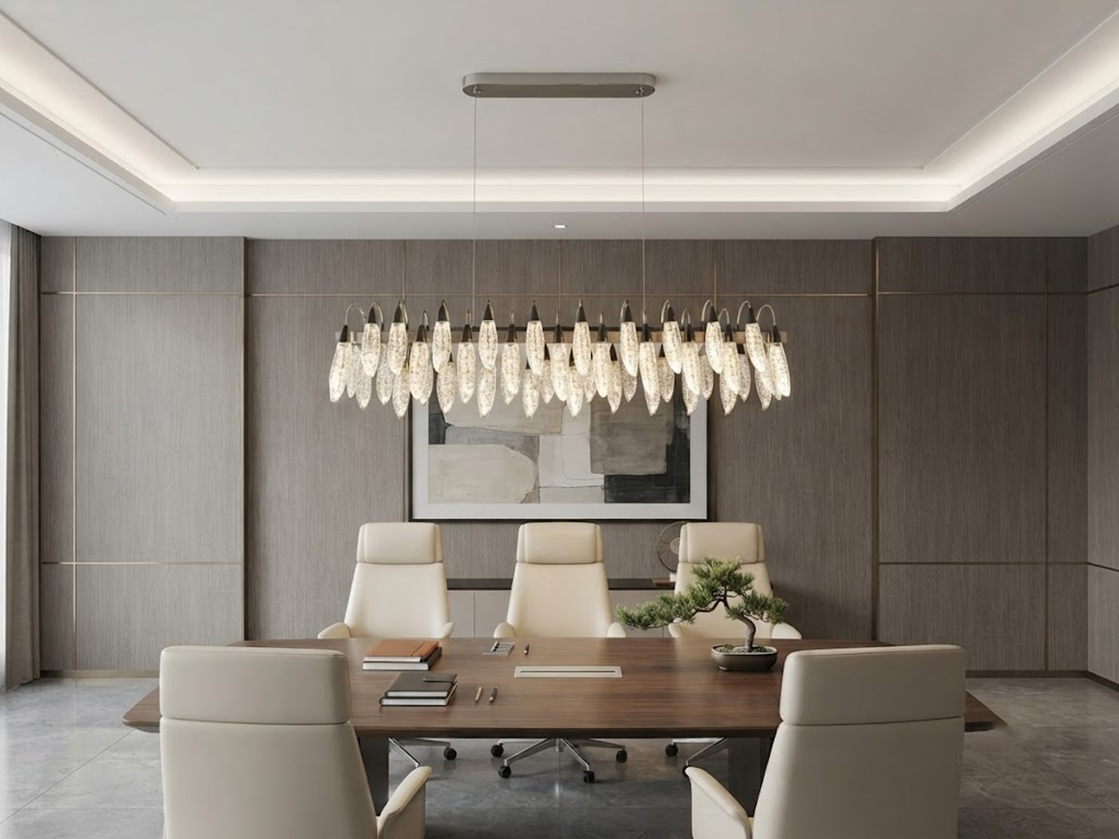 Large crystal-texture feather linear LED chandelier hanging above a luxury marble hotel reception desk in a contemporary lobby